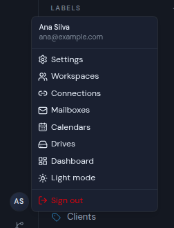 The user menu open, showing your name, email and the menu items